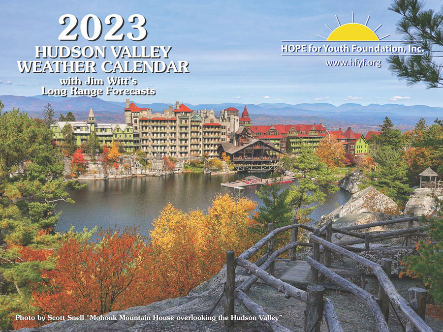 2023 Hudson valley Weather Calendar Cover. There's a small lake with a picturesque hotel around it in the fall.