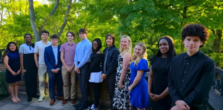 Students pose in a group.