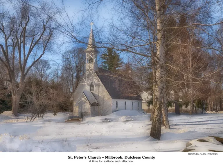 February 2026 calendar picture | a small white church surrounded by snow.